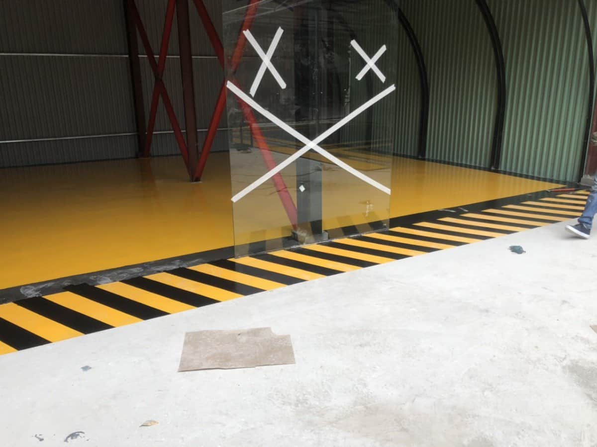 Hoàn thiện thi công sơn epoxy gara xe oto